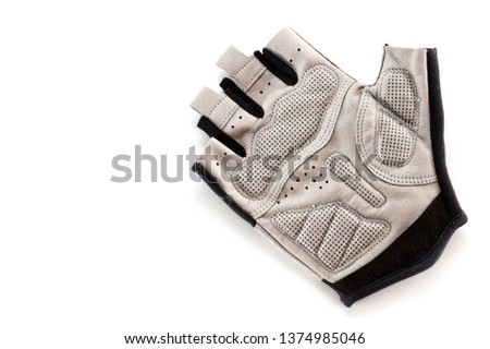 Gray protective gloves for sports and cycling close-up shot.