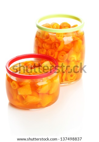 Orange jam with zest, isolated on white