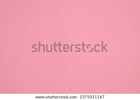 Closeup of entire pastel pink color grunge textured wall