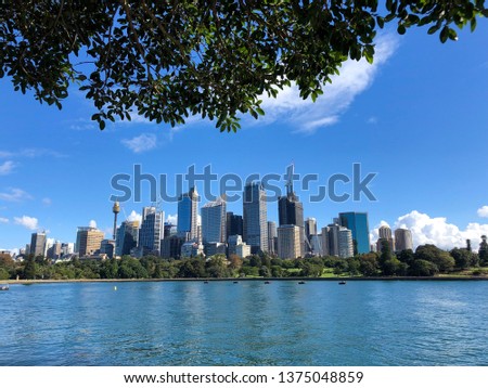 View of clear skies & Sydney CBD over Sydney Harbour from Royal Botanic Gardens, Sydney Australia
