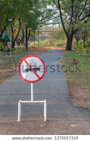 road block sign with pole at the park