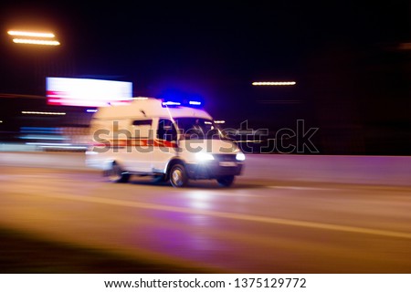 The car rushes on the highway at high speed  Royalty-Free Stock Photo #1375129772