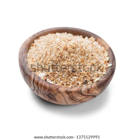 Bread Crumbs in Wooden Bowl isolated on white background.