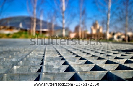 Low angled steel grid frame texture background hd