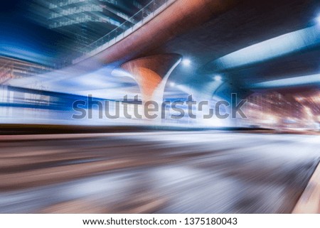 Highway pavement with modern urban architecture as the background