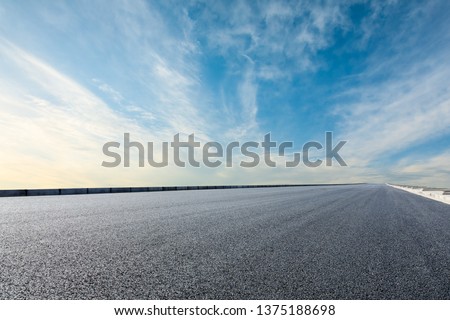 Asphalt road and sky cloud background