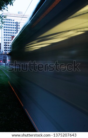 Tram in motion in the downtown of Bilbao