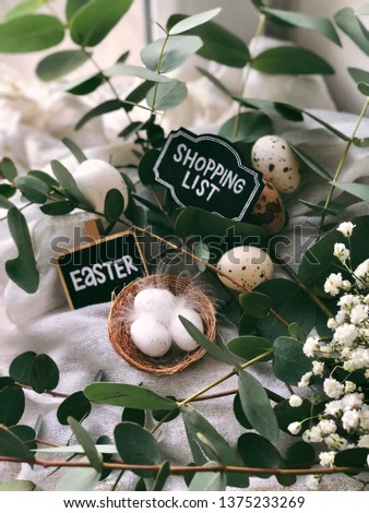 Concept Easter shopping list with flowers and decor