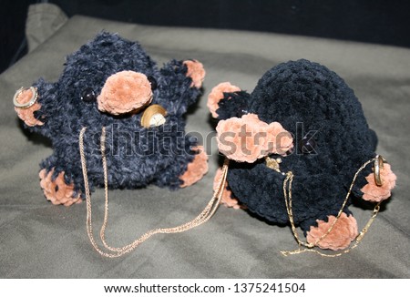 Two little plush chibi amigurumi platypus toys
