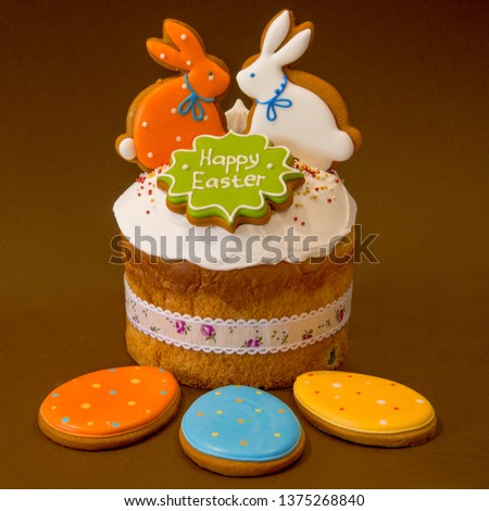 Traditional Easter cake with gingerbread hares and eggs