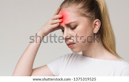Brain diseases problem cause chronic severe headache. Young woman tired and stressed, having mental problem trouble, medical concept Royalty-Free Stock Photo #1375319525