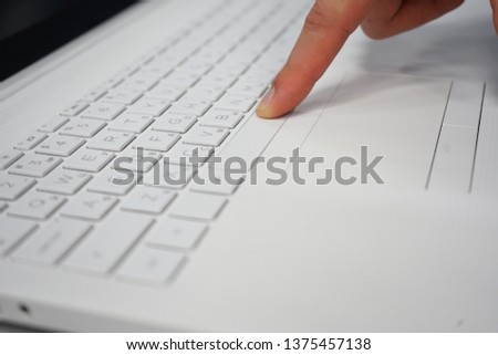    working at home office hand on 
 white keyboard close up    