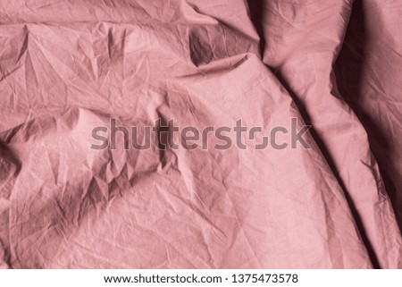 Wrinkled fabric, light color. The texture of the fabric.