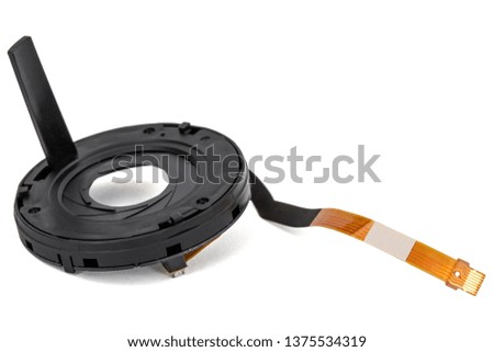 Lens aperture assembly with flex cable and motor, isolated on white background