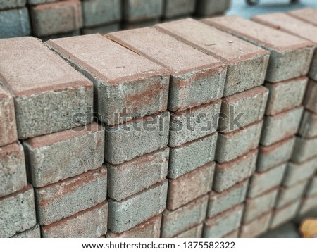 The bricks are stacked in layers.