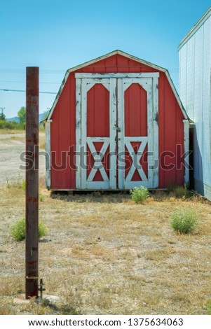 Red shed shot Royalty-Free Stock Photo #1375634063