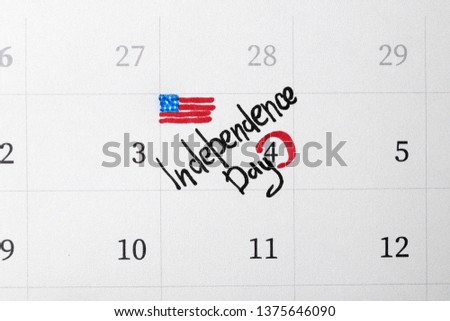 Calendar with inscription "Independence Day" and USA flag drawing, top view