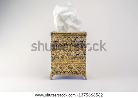 An ormolu tissue box