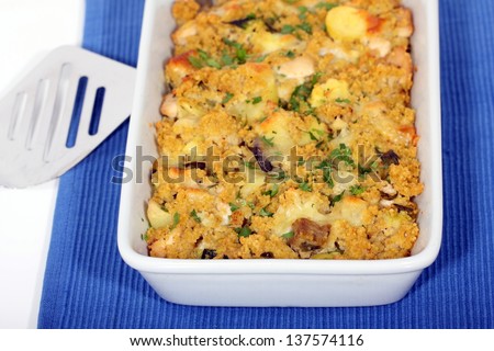 Couscous casserole with vegetables and chicken