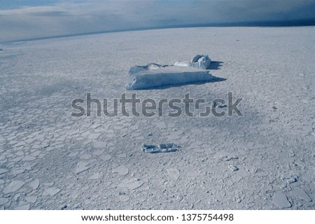 
Stranded iceberg in pack ice Ross Sea