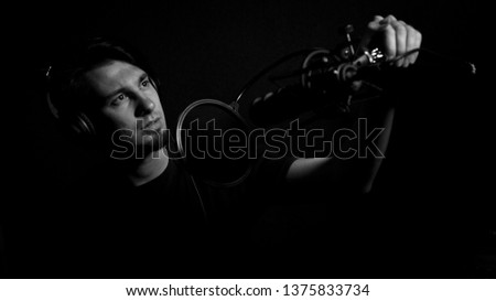 man recording a song at a recording studio. studio sound recording                                  