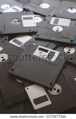 blank floppy disks with soft-focus and over light in the background