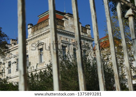 Old psychiatric hospital behind rusty fence, Mental Asylum, Bohnice, Prague