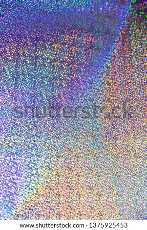 Background multicolored abstract festive rainbow pearl holographic bright with a gradient shining magic with bokeh effect