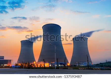 tops of cooling towers of atomic power plant Royalty-Free Stock Photo #137593487