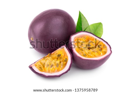 whole passion fruits and a half with leaves isolated on white background. Isolated maracuya Royalty-Free Stock Photo #1375958789