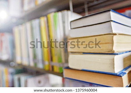 Pile of books - educational concept image of books in the study room or library 