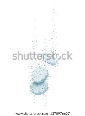 Three medical pills dissolves in water on a white background 