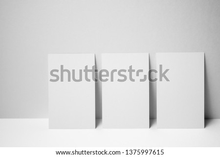 Design concept - front view of 3 vertical business card on white 3D space background for mockup, it's real photo, not 3D render