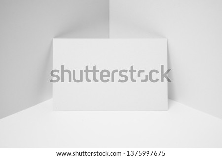 Design concept - front view of horizontal business card on white 3D space background for mockup, it's real photo, not 3D render