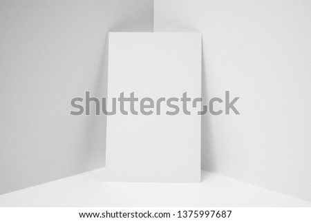 Design concept - front view of vertical business card on white 3D space background for mockup, it's real photo, not 3D render