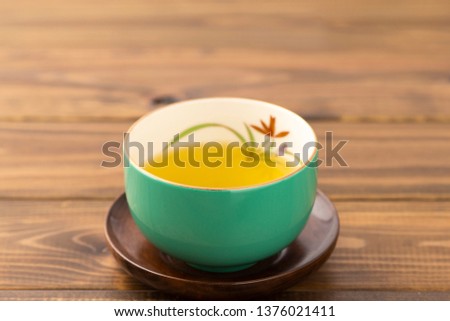 Green tea poured into a Japanese cup