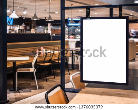 Mock up Poster frame template in Cafe table and seats interior Advertising banner 