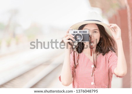 Young Hipster traveler take photo by vintage camera, Travel concept