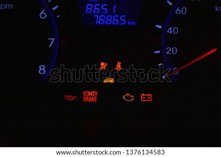 Car Dashboard with Warning Lights On Royalty-Free Stock Photo #1376134583