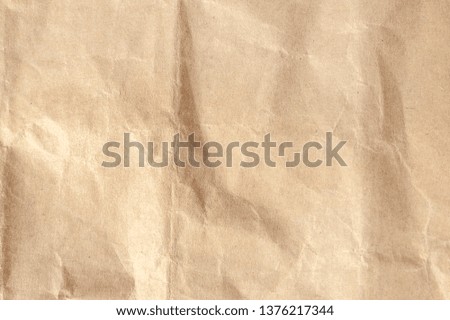 Brown crumpled paper texture for background.
