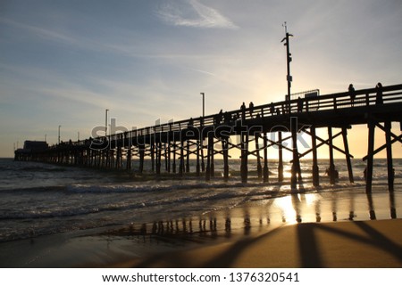 Dramatic sunset at Newport Beach Pier California, USA