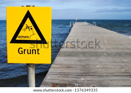 Swedish landing stage with attention sign
