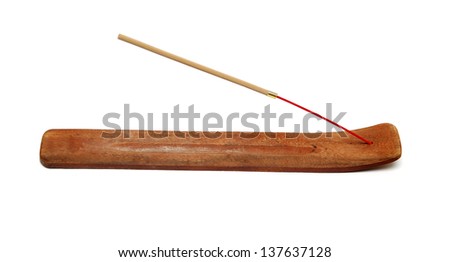 Aromatic stick on a holder from a tree on a white background Royalty-Free Stock Photo #137637128