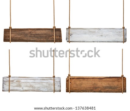 collection of various empty wooden signs hanging on a rope on white background. each one is shot separately
