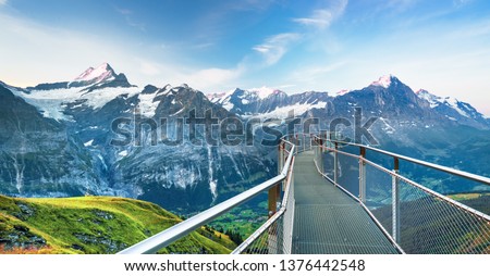 Morning view on Bernese range above Bachalpsee lake with Mounch, Eiger Faulhorn and Reti peaks. Popular tourist destination. Location place Switzerland alps, Grindelwald valley, Europe. 