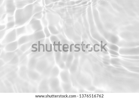 white water wave texture or natural ripple background Royalty-Free Stock Photo #1376516762