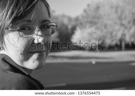 Middle aged white female with glasses