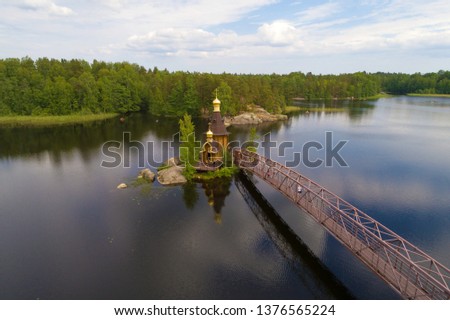 View of the Church of the Apostle Andrew the First-Called on the Vuoksa River on a June afternoon (shooting from a quadrocopter). Vasilyevo, Russia