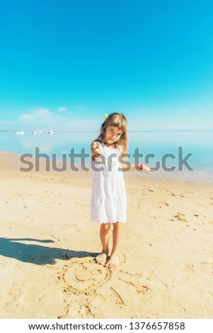 Child on the beach. Sea shore. Selective focus. nature