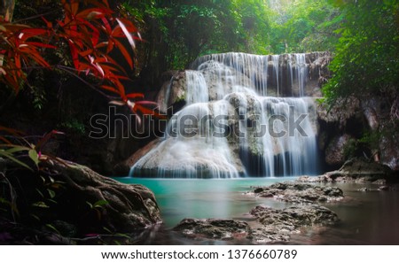 Waterfall hidden in the tropical jungle,(Huay Mae Kamin Waterfall in Kanchanaburi Province, Thailand) 